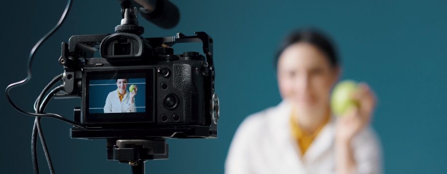 Healthcare professional in front of a camera. 